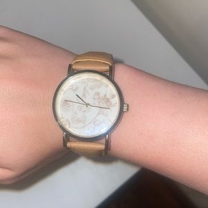 Watch with floral face and brown/tan leather strap